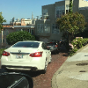 Riding down curvy Lombard St